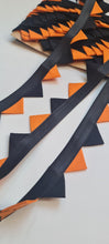 Load image into Gallery viewer, Black and orange bunting trim
